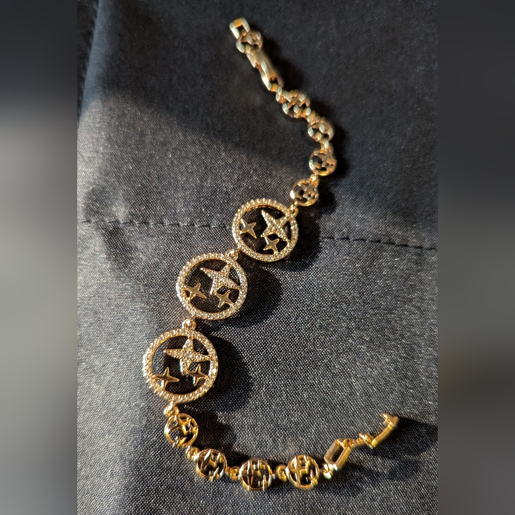 Pretty Bird Cz And Gold Star Bracelet 35$